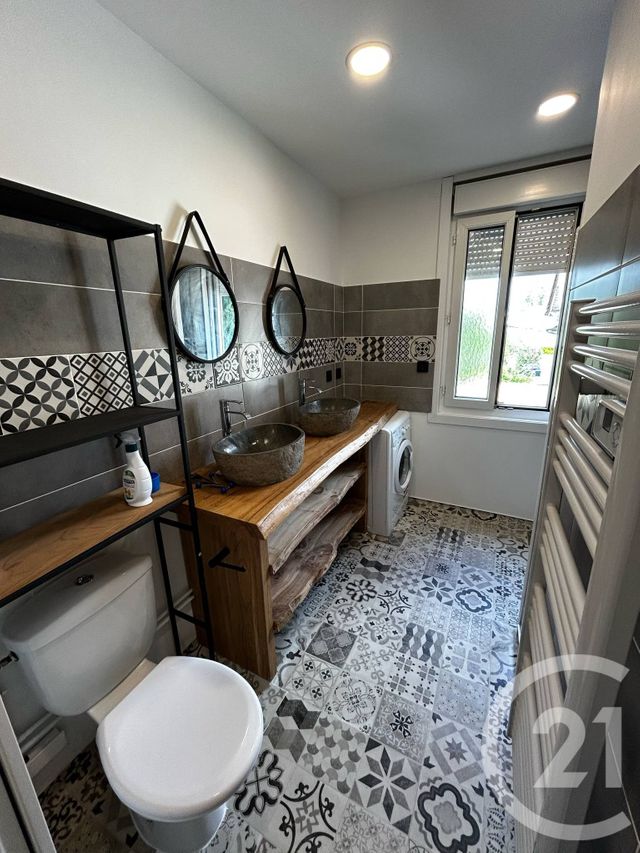 Appartement à louer - 2 pièces - 56.17 m2 - LIBOURNE - 33 - AQUITAINE - Century 21 G&B Immobilier